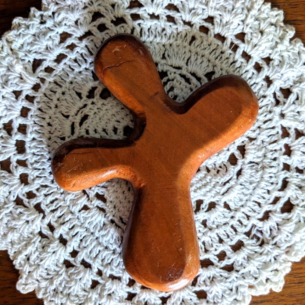 The Clinging Cross. Individually handcrafted of cherry wood.